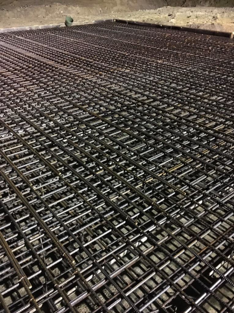 Ground-bearing slab reinforcement grid