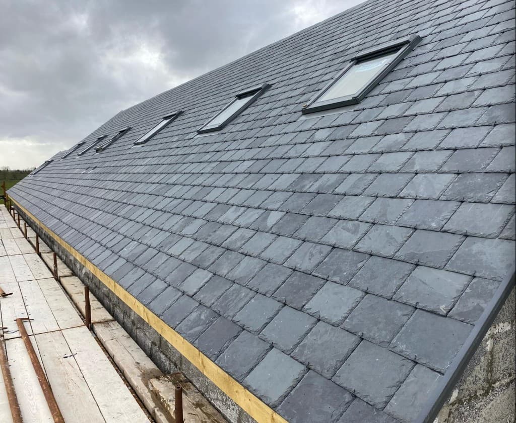 Completed slate roof detail and rooflight installation
